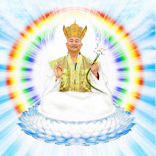 A devotional image of Living Buddha Lian Sheng, crowned and seated on a lotus within rings of rainbow light